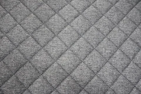 This Textured Fabric Pattern features a unique Geometric Quilted Design, adding Foto stock