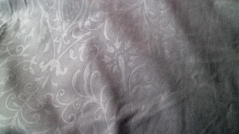 Textured Fabric with Subtle Floral Pattern Stock Photos