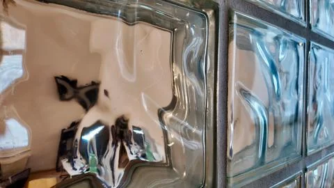 Textured Glass Blocks Creating a Distorted Indoor Reflection Stock Photos