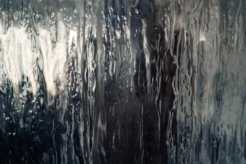 Textured glass with dark reflection,close up Stock Photos