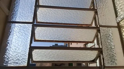 Textured glass louvre window opening for ventilation in motion video Stock Footage 339301846