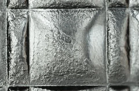 Textured glass panel with strong reflections and deep shadows Stock Photos