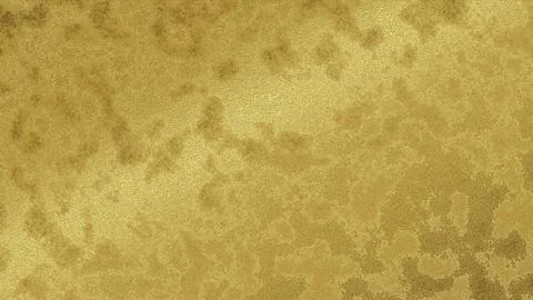 A textured gold background shows a rough surface with a muted tone and mottle Illustrazione stock