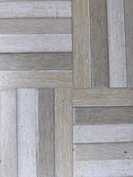 Textured Gray and Beige Interlocking Floor Tile Pattern Background Foto stock