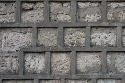 Textured gray brick wall background Stock Photos