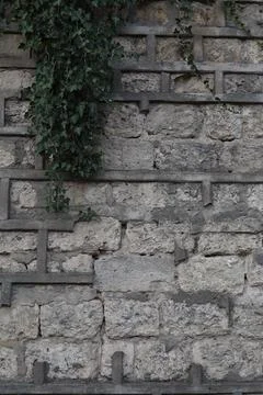 Textured gray brick wall background Stock Photos