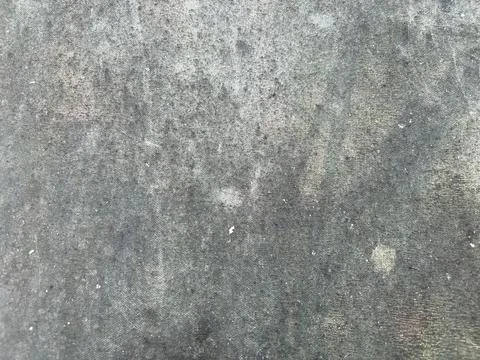Textured gray concrete surface with circular scratches and worn details Stock Photos
