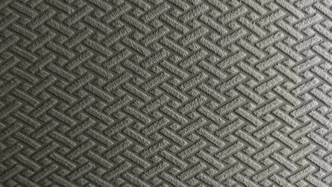 Textured gray fabric background with elegant embossed geometric basketweave p Stock Photos