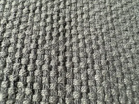 Textured gray fabric in waffle pattern, close-up shot, suitable as backgrou.. Stock Photos