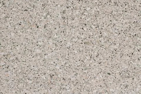 Textured gray granite horizontal background with small black particles Stock Photos