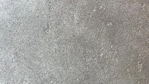Textured Gray Stone Wall Surface Close-up Stock Footage 332320680