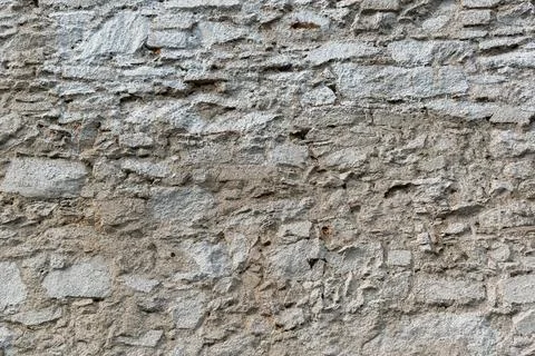 Textured Gray Stone Wall Surface With Natural Weathering Patterns Stock Photos