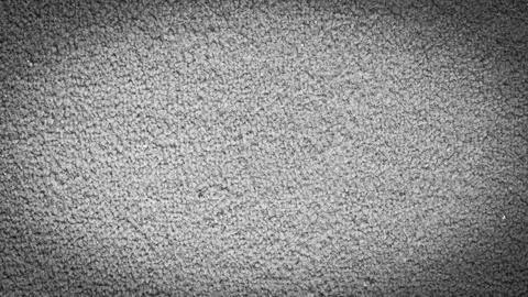 Textured gray surface captures soft light creating an inviting atmosphere f.. Stock Photos