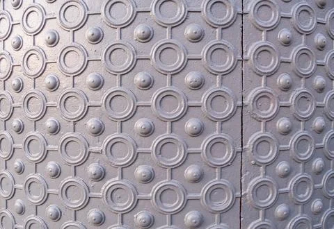 Textured Gray Surface with Circular Patterns 스톡 사진