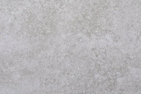 Textured gray surface with subtle patterns suitable for backgrounds or Stock Photos