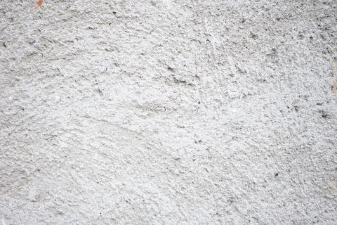 Textured gray wall surface with subtle variations in color and tone Stock Photos