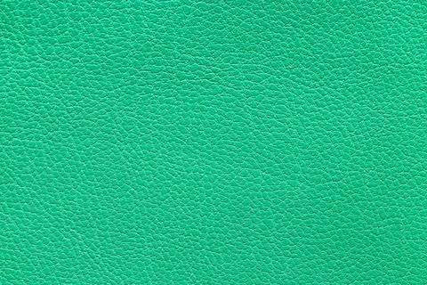 Textured green leather surface background, abstract material design, fashion  Stock Photos