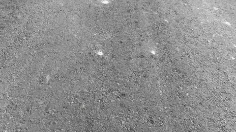 Textured Grey Asphalt Road Surface Background Stockbeeldmateriaal 337414885