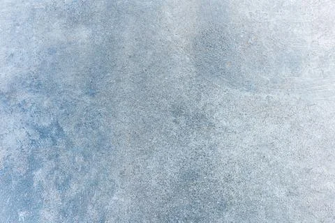 Textured grey concrete surface with a rough industrial floor pattern concre.. Stock Photos