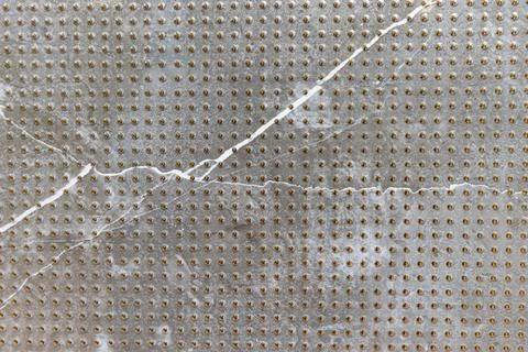 Textured grey stone tile surface with white veins Stock Photos