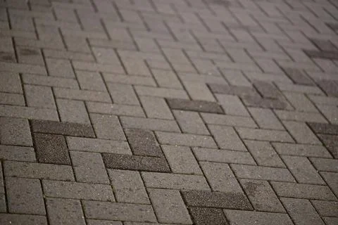 Textured Herringbone Pattern Pavement 库存照片