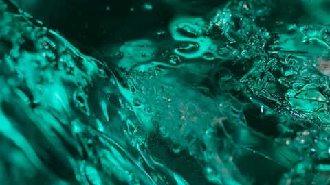 Textured icecube on glass Stock Footage 125299716