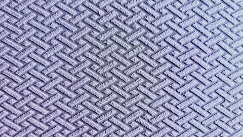 Textured lavender geometric fabric pattern with embossed woven diagonal lines 库存照片