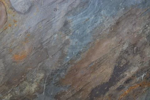 Textured Layered Stone Background with Rust Colors. Abstract Rock Surface Stock Photos