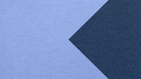 Textured light blue paper background with navy arrow, macro. Template with .. Stock Photos