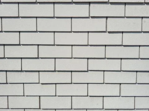 This is a textured light gray brick wall background that can serve various .. Stock Photos