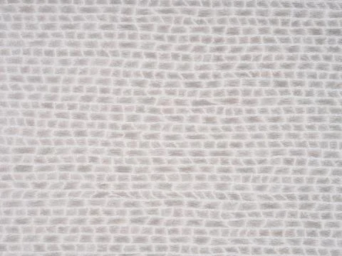 Textured light gray veneer surface with an embossed grid pattern Fotos de archivo