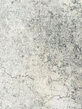 A textured light grey surface featuring distressed patterns with dark scrat.. Stock Photos