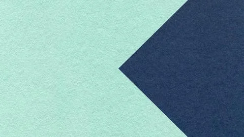 Textured light mint green paper background with dark blue arrow, macro. Tem.. Stock Photos