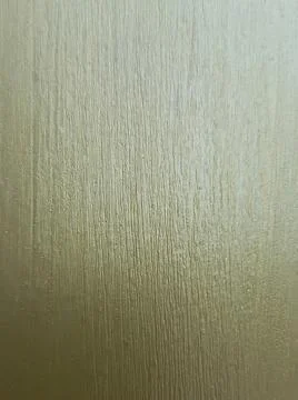 Textured metallic gold wall surface with gold texture Stock Photos