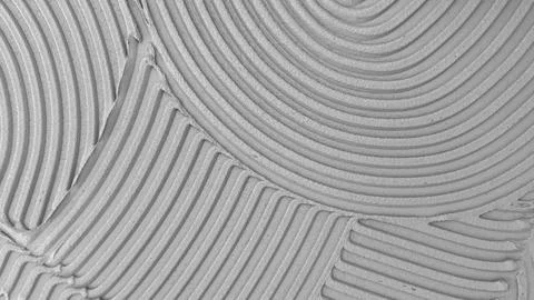 Textured Mortar Surface Created With Notched Trowel Fotos de archivo