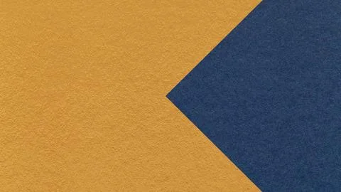 Textured mustard paper background with dark blue arrow, macro. Template wit.. Illustrazione stock