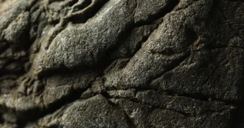 Textured Natural Stone Surface with Layered Rock Formation Stock Footage 291944279