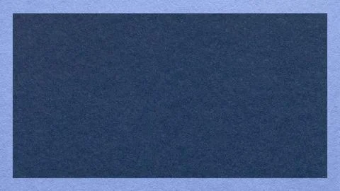 Textured navy paper background with light blue border. Backdrop with frame .. 写真素材