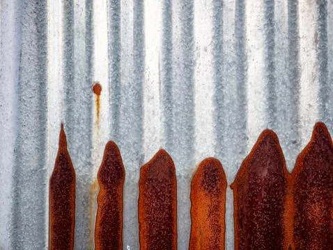 Textured of old rusty zinc galvanized iron sheet. Stock Photos