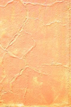 Textured orange wall with subtle cracks and pattern 写真素材