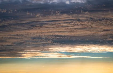 Textured pastel colored clouds Stock Photos