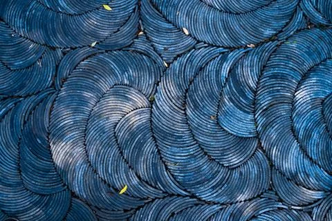 Textured Pattern Of Blue Stone Tile Flooring In Historic Courtyard Stock Photos