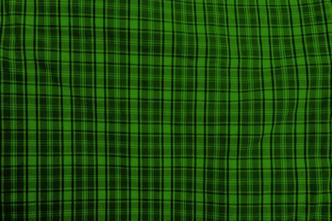 A textured pattern of green squares creating a calming, abstract visual. Stock Photos