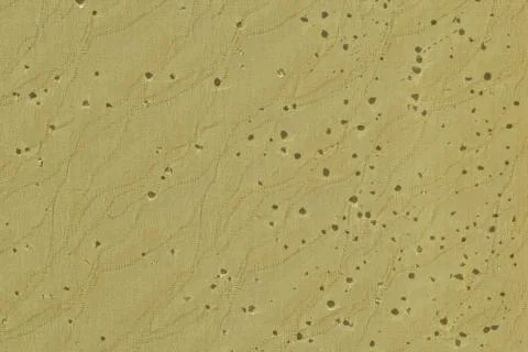 The textured pattern left by the drop shadow on the fabric. Stock Photos