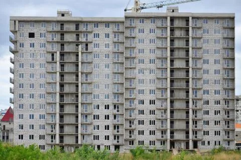 Textured pattern of a russian whitestone residential house building wall with Fotos de archivo