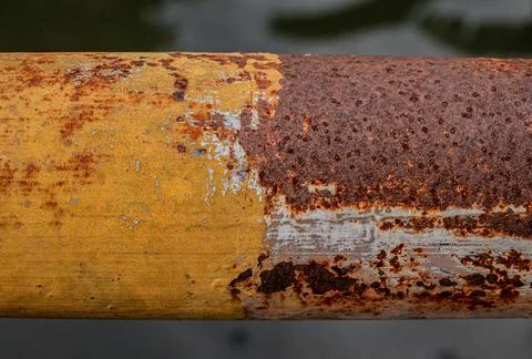Textured peeling rust flakes Stock Photos