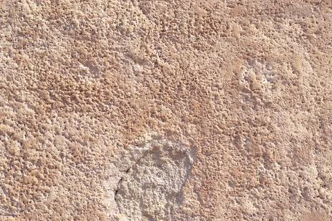 Textured plaster cement wall with cracks and stains Stock Photos