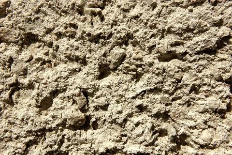 Textured Plaster Wall Background Featuring a Rough, Natural Finish Commonly.. Stock Photos