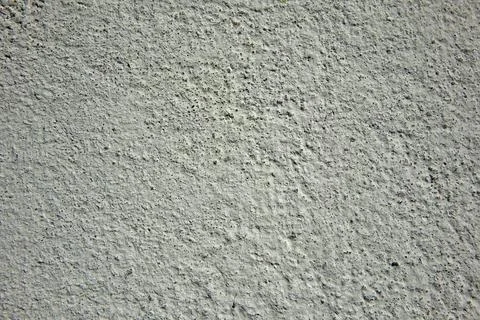 Textured Plaster Wall Background With Subtle Details and Imperfections in N.. Stock Photos