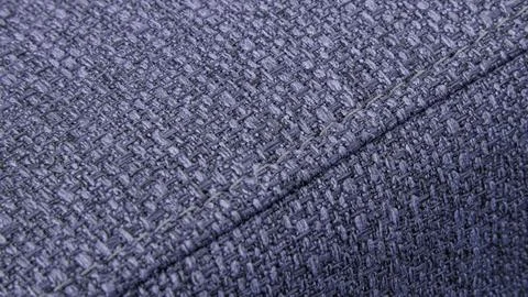 Textured Purple textile background with diagonal stitching Stock Photos